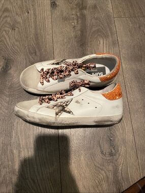 Golden Goose Super Star White Sneakers with Orange Glitter Heel Leopard Laces